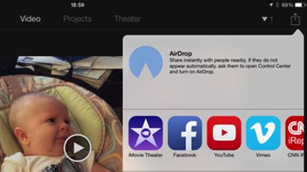 **Figure 88:** In iMovie for iOS, to upload a video to iMovie Theater, tap the Share button, then tap the purple iMovie Theater button.