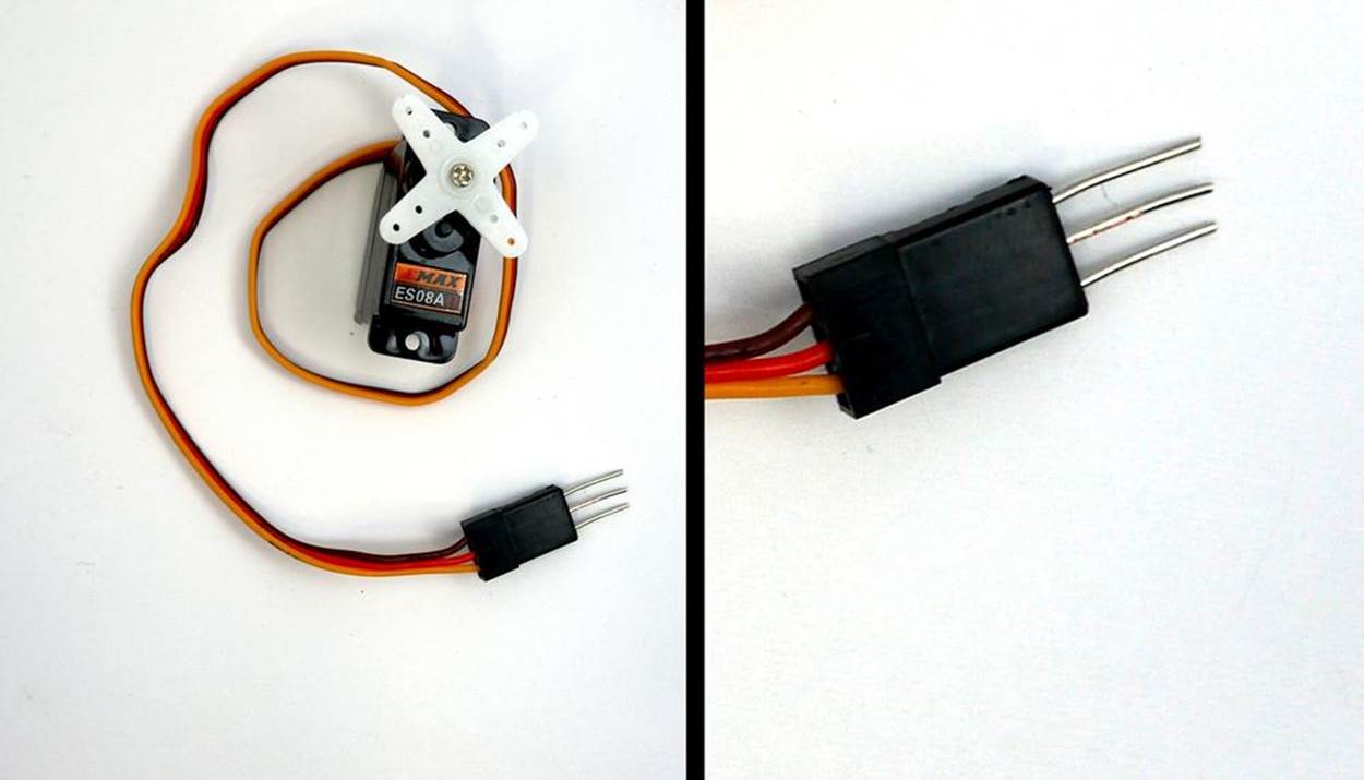 Servo motor with mechanical assembly attachment and modified servo motor wire connector (left); close-up of modified servo motor wire connector (right)