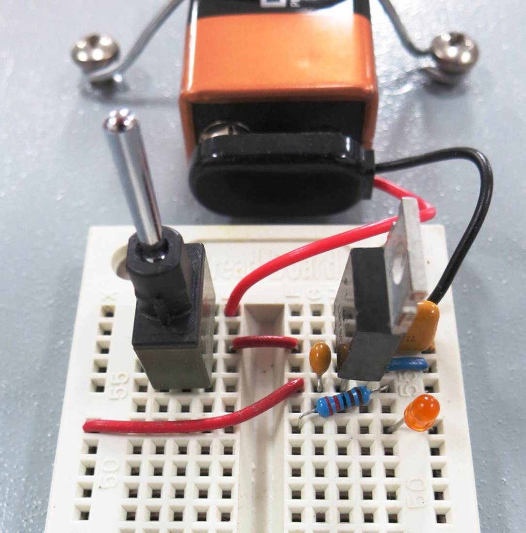 Placement of components to provide a regulated 5VDC power supply.