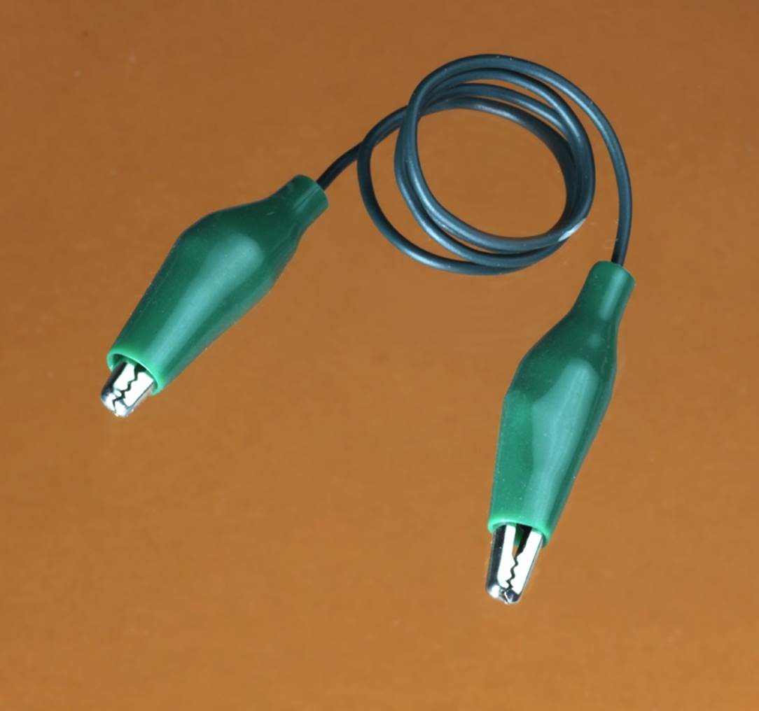 This type of jumper wire with an alligator clip at each end can be used as a “grabber substitute,” with one alligator gripping a meter probe while the other grips a wire or connection in a circuit that is being tested.