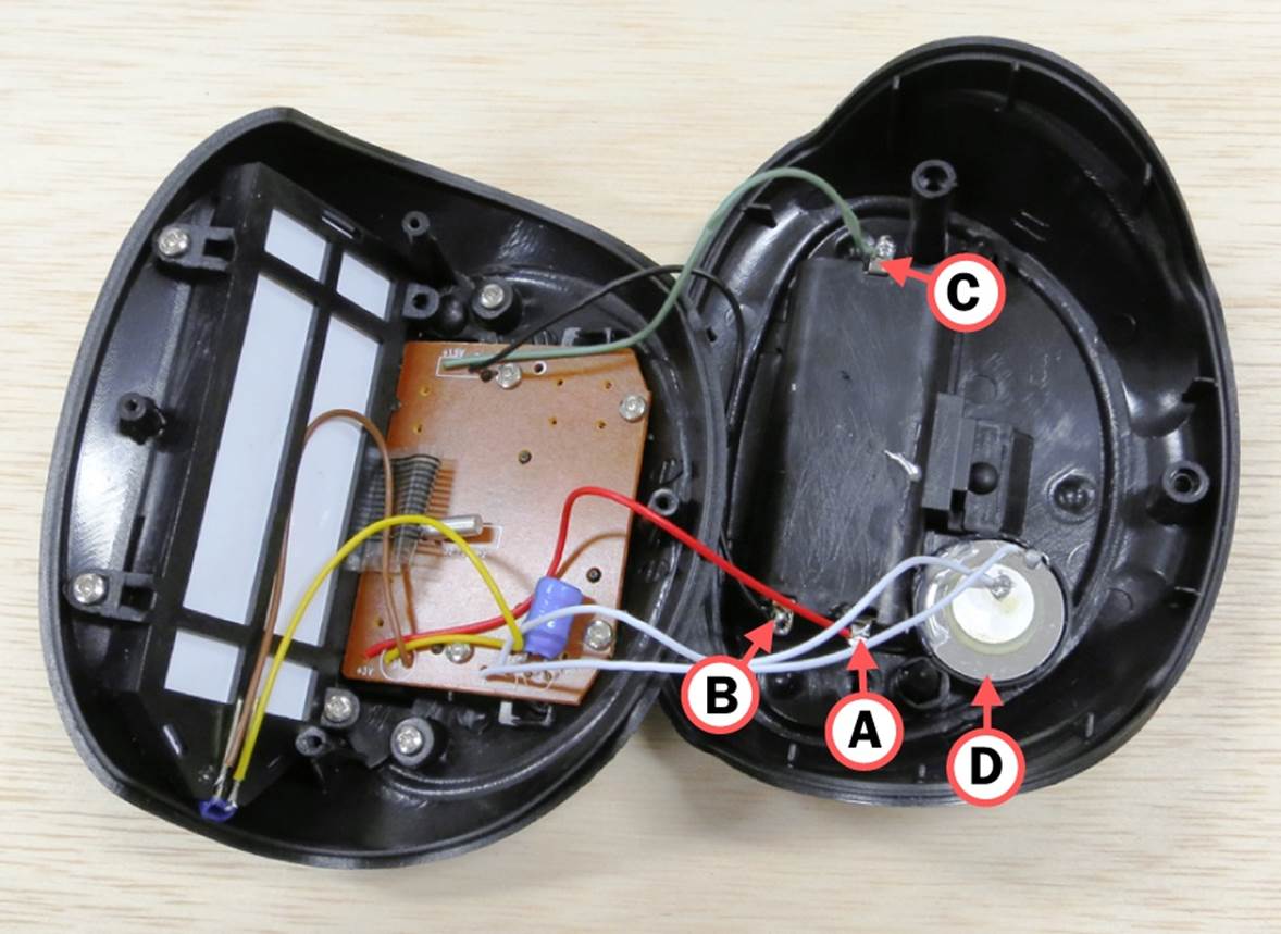 3V battery power is delivered through tabs A and B. Tab C provides 1.5V for the clock chip. D identifies the beeper.