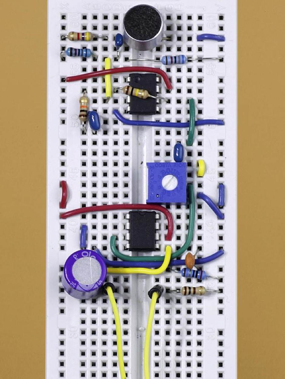 A breadboarded version of the simple circuit using an LM386 amplifier. Yellow wires at the bottom of the picture are connected with a loudspeaker, not shown. The circuit can run for a limited time from a 9V battery.