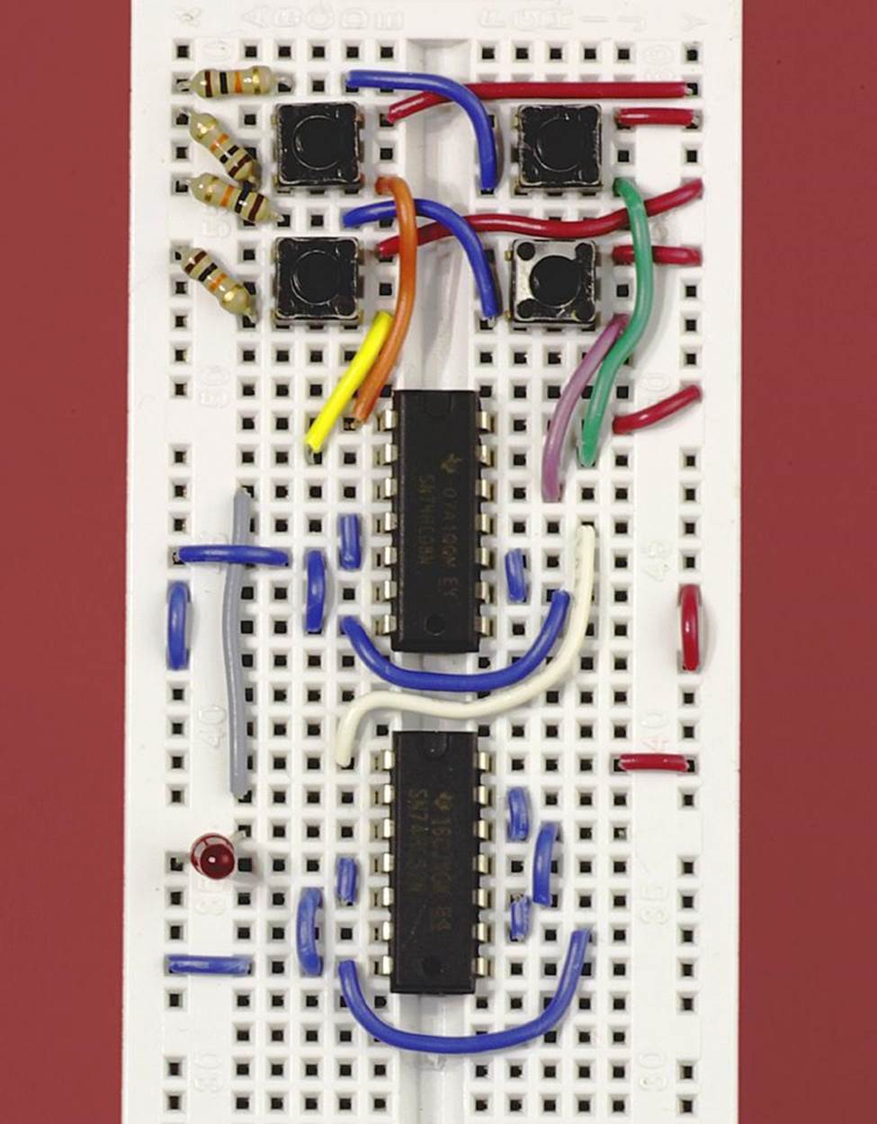 The simplest and most basic demonstration version of the Telepathy Tester. Pushbuttons for the participants are included as four tactile switches at the top. The LED at lower left is the only output.Telepathy Testbasic demo version