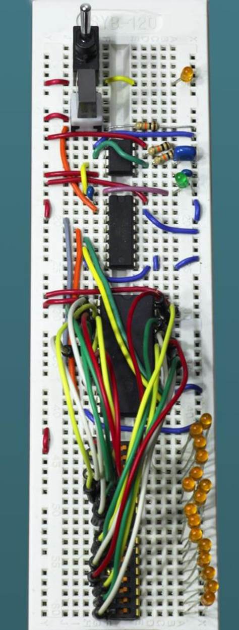The breadboarded version of the Hot Slot game, using DIP switches as a substitute for coin slots.