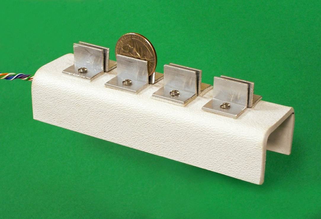 A simple type of coin slot for the Hot Slot game that can be made relatively easily while providing a reliable contact with the coin.