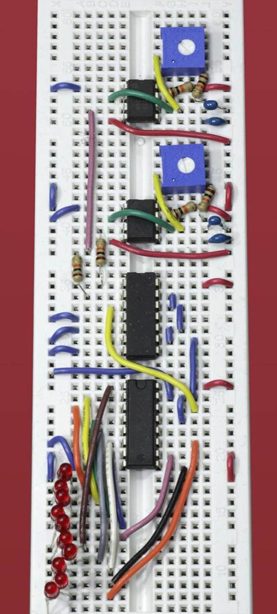 The idea first mentioned in Experiment 22, of XORing the outputs of two timers that are slightly out of phase, is applied here to create a seemingly random fluctuation of the counter controlling ten LEDs.