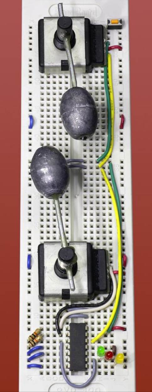 Breadboarded version of the Rotational Equivocator. No series resistors are included with the LEDs, as they have their own internal resistors.