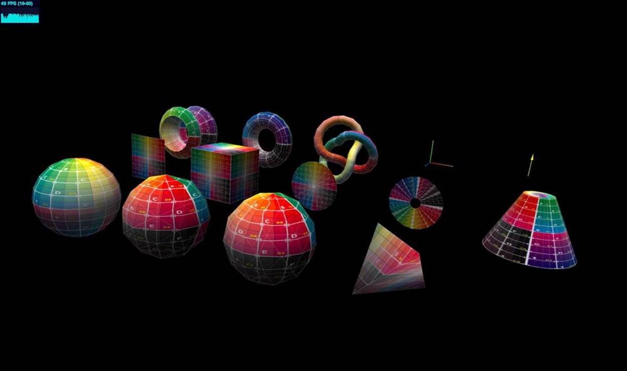 Three.js built-in geometry demo. Pictured left to right and front to back: sphere, icosahedron, octahedron, tetrahedron; plane, cube, circle, ring, cylinder; lathe, torus, and torus knot; line drawing of x, y, z axes and up orientation vector