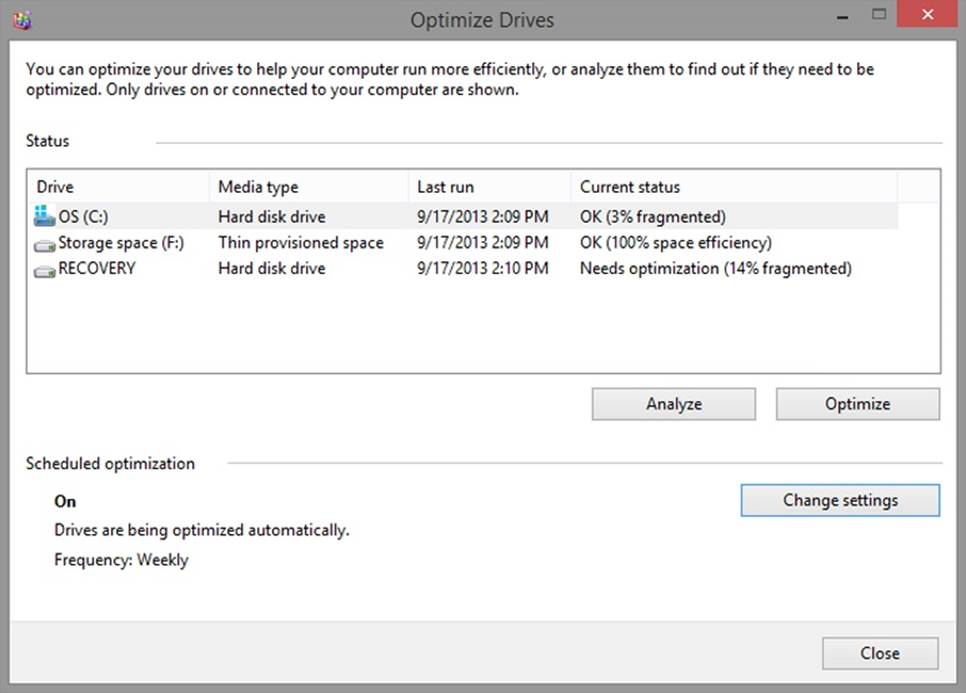 A screen shot of the Optimize Drives dialog box, where you can choose to analyze or optimize drives on the system or choose to change settings for scheduled optimization.