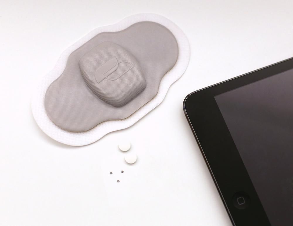The Proteus smart pill contains a tiny sensor—it has no battery, but is activated by contact with stomach acid, sending a small transmission to a Bluetooth-enabled skin patch, which in turn connects to a mobile phone and notifies relatives or doctors via an Internet service that a pill was taken (image: Proteus Health)