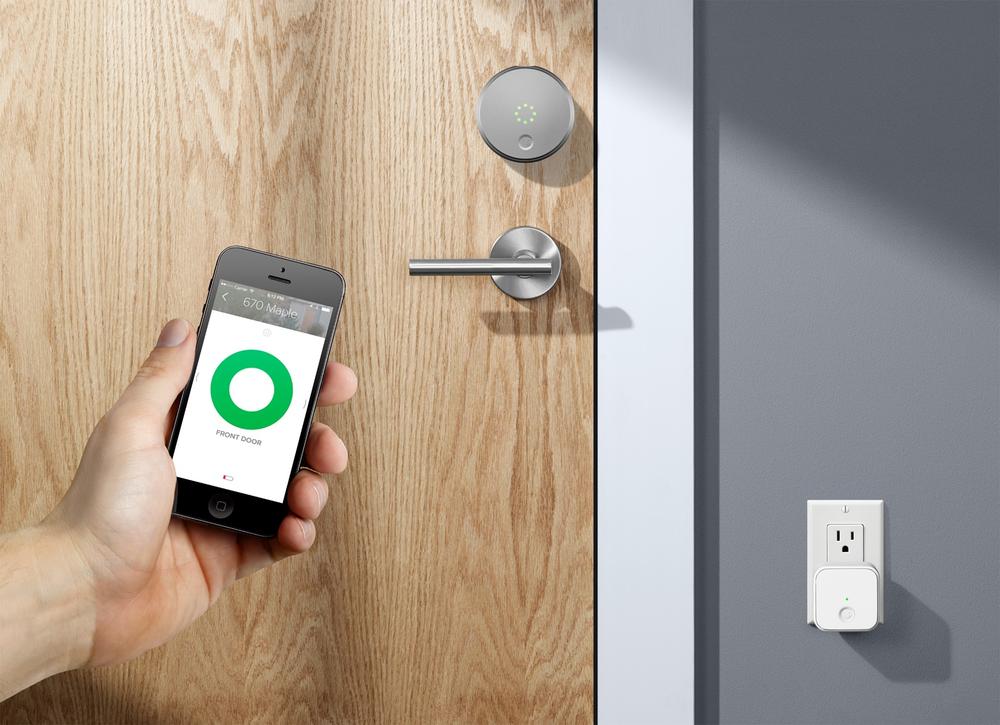 The August door lock, app, and hub (plugged into outlet; image: August)